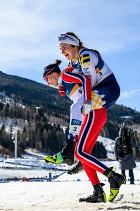 260222 Heidi Weng of Norway and Ebba Andersson of Sweden celebrate after competing in the women s 50km classic technique cross-country skiing race during day 16 of the 2026 Winter Olympics on February 22, 2026 in Val di Fiemme. Photo: Maxim Thore BILDBYRAN kod MT MT1003 jubel sweden sverige norge norway skidor cross-country skiing langrenn Olympic Games, Olympische Spiele, Olympia, OS olympics winter olympics os ol olympiska spel vinter-os olympiske leker milano cortina 2026 milan cortina 2026 milano cortina 2026 olympic games milano cortina 2026 winter olympic games milano cortina-os milano cortina-ol vinter-ol 16 bbeng *** 260222 Heidi Weng of Norway and Ebba Andersson of Sweden celebrate after competing in the women s 50km classic technique cross country skiing race during day 16 of the 2026 Winter Olympics on February 22, 2026 in Val di Fiemme Photo Maxim Thore BILDBYRAN kod MT MT1003 jubel sweden sverige norge norway skidor cross country skiing langrenn olympic games olympics winter olympics os ol olympiska spel vinter os olympiske leker milano cortina 2026 milan cortina 2026 milano cortina 2026 olympic games milano cortina 2026 winter olympic games milano cortina os milano cortina ol vinter ol 16 bbeng  Copyright: MAXIMxTHORE BB260222MT101