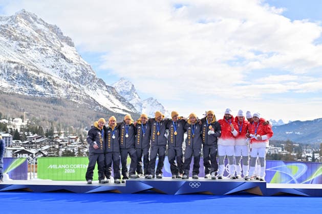 Cortina d Ampezzo, Italy, February 22th 2026. First place and Gold medal Johannes Lochner, Thorsten Margis, Jorn Wenzel, Georg Fleischhauer of Germany, Second place and Silver medal Francesco Friedrich, Matthias Sommer, Alexander Schuller, Felix Straub of Germany and Third place and Bronze medal Michael Vogt, Andreas Haas, Amadou David Ndiaye, Aeberhard of Switzwerland celebrate in podium after the Bobsleight 4-man Heat 4 race of the Olympic Winter games, Winterspiele,Spiele, Summer games 2026 in Cortina d Ampezzo, Italy. (Photo by Igor Kupljenik Sports Press Photo)  Copyright: xIgorxKupljenikx xSPPx Sportspressphoto_SPR96167