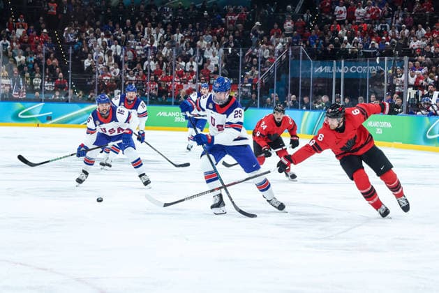 USA s Brock Nelson in action against Canada s Travis Sanheim during the Olympic Winter games, Winterspiele,Spiele, Summer games Milano-Cortina 2026, Men s Ice hockey, Eishockey Final - Canada vs USA on February 22, 2026 at Milano Santagiulia Ice Hockey Arena in Milan, Italy  Copyright: xFabrizioxCarabelli IPAxSportx xipa-agency.netx xx IPA_71869783 IPA_Agency_IPA71869783