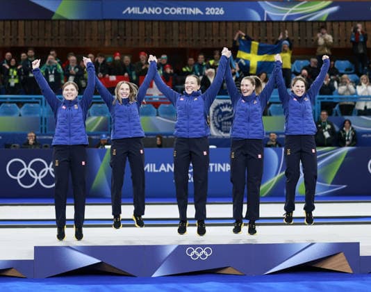 Milan Cortina Olympics: Curling Members of the Swedish women s curling team celebrate after winning gold at the Milan Cortina Olympics on Feb. 22, 2026, at Cortina Curling Olympic Stadium in Cortina d Ampezzo, Italy.  A14AA0005315190P