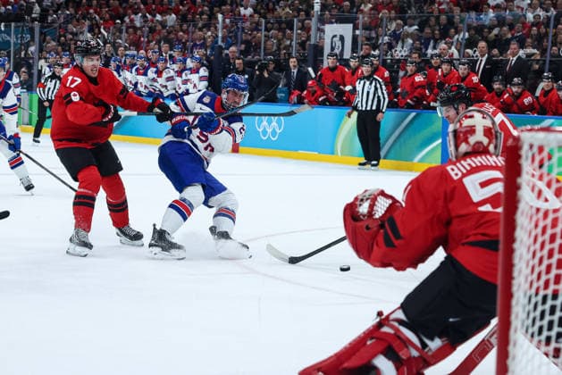 USA s Brock Nelson tries to score hidered by Canada s Macklin Celebrini during the Olympic Winter games, Winterspiele,Spiele, Summer games Milano-Cortina 2026, Men s Ice hockey, Eishockey Final - Canada vs USA on February 22, 2026 at Milano Santagiulia Ice Hockey Arena in Milan, Italy  Copyright: xFabrizioxCarabelli IPAxSportx xipa-agency.netx xx IPA_71870061 IPA_Agency_IPA71870061
