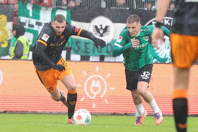 22.02.2026, xrekx, Fussball 2.Bundesliga, Preußen Münster - 1.FC Kaiserslautern v.l. Luca Sirch (1.FC Kaiserslautern) Tobias Raschl (Preussen Muenster) Zweikampf, Aktion, action, battle for the ball (DFL DFB REGULATIONS PROHIBIT ANY USE OF PHOTOGRAPHS as IMAGE SEQUENCES and or QUASI-VIDEO) Münster