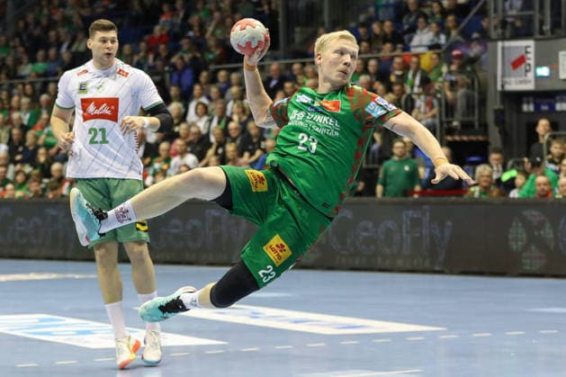 22.02.2026, xgox, Handball - Daikin HBL SC Magdeburg - GWD Minden emspor, v.l. Magnus Saugstrup (Magdeburg, 23) wirft Tor, Torschuetze, erzielt Tor, Treffer, scores the goal Magdeburg