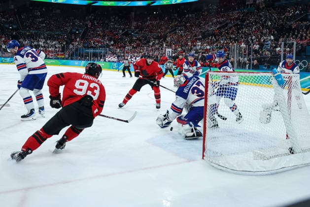 USA s Connor Hellebuyck saves a goal by Canada s Mitch Marner during the Olympic Winter games, Winterspiele,Spiele, Summer games Milano-Cortina 2026, Men s Ice hockey, Eishockey Final - Canada vs USA on February 22, 2026 at Milano Santagiulia Ice Hockey Arena in Milan, Italy  Copyright: xFabrizioxCarabelli IPAxSportx xipa-agency.netx xx IPA_71871891 IPA_Agency_IPA71871891