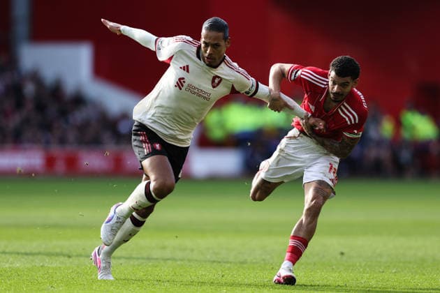 Nottingham, England, 22nd February 2026. Virgil van Dijk of Liverpool holds off Morgan Gibbs-White of Nottingham Forest during the Nottingham Forest vs Liverpool Premier League match at the City Ground, Nottingham. Picture credit should read: Gareth Evans Sportimage EDITORIAL USE ONLY. No use with unauthorised audio, video, data, fixture lists, club league logos or live services. Online in-match use limited to 120 images, no video emulation. No use in betting, games or single club league player publications. SPI_037_NFFC_vs_LFC SPI-4544-0038