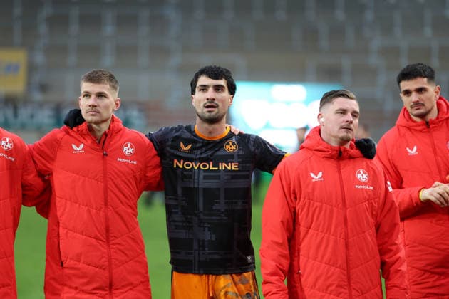22.02.2026, xrekx, Fussball 2.Bundesliga, Preußen Münster - 1.FC Kaiserslautern v.l. FCK Mannschaft, Spieler, jubeln nach Spielende, Team, Player, celebrate at the end of the match Paul Joly (1.FC Kaiserslautern) Mahir Emreli (1.FC Kaiserslautern) Marlon Ritter (1.FC Kaiserslautern) Simon Simoni (1.FC Kaiserslautern) (DFL DFB REGULATIONS PROHIBIT ANY USE OF PHOTOGRAPHS as IMAGE SEQUENCES and or QUASI-VIDEO) Münster