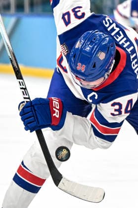 MILAN, ITALY - FEBRUARY 22: Auston Matthews of United States looks at the gold medal puck during the Ice hockey, Eishockey Men™s Gold Medal Game match between Canada and USA on day sixteen of the Milano Cortina 2026 Winter Olympic Games, Olympische Spiele, Olympia, OS at Milano Santagiulia Ice Hockey Arena on February 22, 2026 in Milan, Italy. Milan Milano Santagiulia Ice Hockey Arena Italy *** MILAN, ITALY FEBRUARY 22 Auston Matthews of United States looks at the gold medal puck during the Ice Hockey Men™s Gold Medal Game match between Canada and USA on day sixteen of the Milano Cortina 2026 Winter Olympic games at Milano Santagiulia Ice Hockey Arena on February 22, 2026 in Milan, Italy Milan Milano Santagiulia Ice Hockey Arena Italy Copyright: xJustPictures.ch AndreaxBrancax jp-en-EuSpIm-AB-AAB_108822022026
