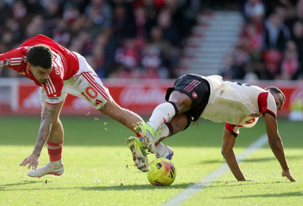 Nottingham Forest v Liverpool - Premier League Morgan Gibbs-White of Nottingham Forest and Ryan Gravenberch of Liverpool challenge during the Premier League match between Nottingham Forest and Liverpool at City Ground on February 22, 2026 in Nottingham, England. WARNING! This Photograph May Only Be Used For Newspaper And Or Magazine Editorial Purposes. May Not Be Used For Publications Involving 1 player, 1 Club Or 1 Competition Without Written Authorisation From Football DataCo Ltd. For Any Queries, Please Contact Football DataCo Ltd on +44 (0) 207 864 9121 Nottingham City Ground England United Kingdom Copyright: xAllstarxPicturexLibraryxLtdx