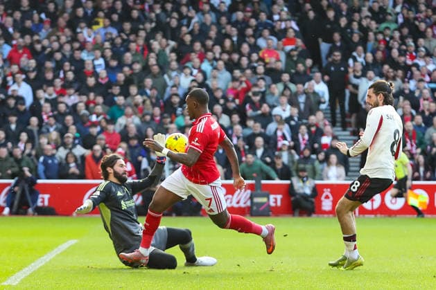 Nottingham Forest v Liverpool, Premier League Callum Hudson-Odoi Of Nottingham Forest sees his chipped shot saved by Alisson Becker Of Liverpool during the Nottingham Forest v Liverpool Premier League match at the City Ground, West Bridgford, England on 22 February 2026 Credit: Lee Keuneke Every Second Media Editorial use only. All images are copyright Every Second Media Limited. No images may be reproduced without prior permission. All rights reserved. Premier League and Football League images are subject to licensing agreements with Football DataCo Limited. see https: www.football-dataco.com Copyright: xIMAGO EveryxSecondxMediax ESM-1816-0041 LeexKeunekex xEveryxSecondxMediax