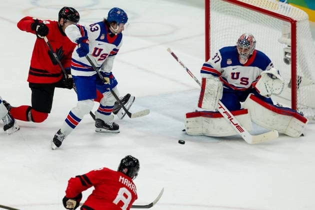 February 22, 2026, Milano, Lombardy, Italy: Cale Makar (8) of Canada shoots goal on Connor Hellebuyck (37) of the United States during the second period in the Gold medal Ice hockey, Eishockey Men game during the 2026 Winter Olympics at the Milano Santagiulia Ice Hockey Arena on Sunday in Milano. Milano Italy - ZUMAj89_ 20260222_oly_j89_010 Copyright: xPaulxKitagakixJr.x