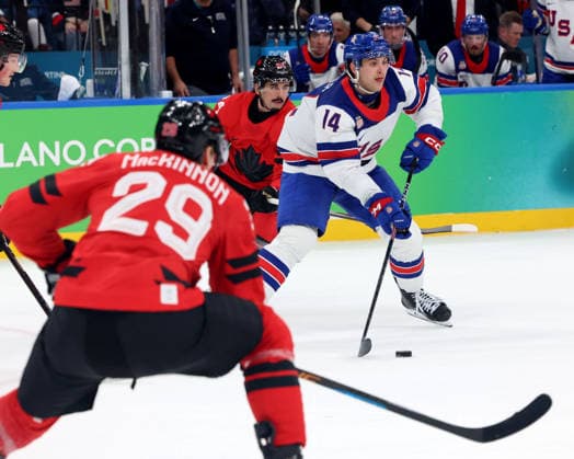 February 22, 2026, Milan, Lombardy, Italy: Brock Faber (14) of Team United States against Team Canada in the men s Ice hockey, Eishockey gold medal game during the Milano Cortina 2026 Olympic Winter games, Winterspiele,Spiele, Summer games at Milano Santagiulia Ice Hockey Arena. Olympics 2026: Milano Cortina: Ice Hockey-Men Finals - Gold Medal Game-CAN V USA  - ZUMAm117 20260222_oly_m117_029 Copyright: xDavidxMcIntyrex