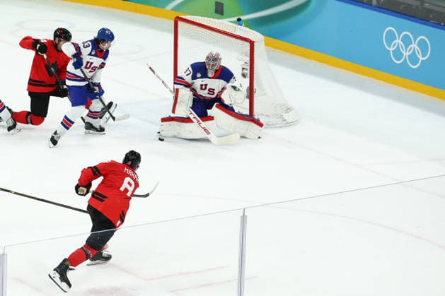 February 22, 2026, Milan, Italy: CALE MAKAR of Canada scores his side s first goal during the gold medal Ice hockey, Eishockey game against the USA at the Milano Cortina 2026 Olympic Games, Olympische Spiele, Olympia, OS Milan Italy - ZUMAc179 20260222_oly_c179_026 Copyright: xMickaelxChavetx