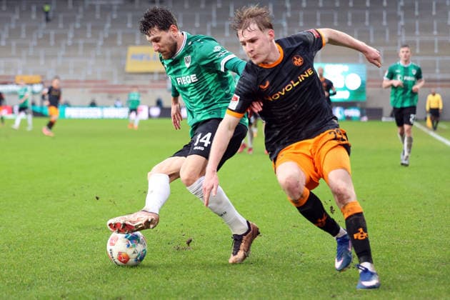 22.02.2026, xrekx, Fussball 2.Bundesliga, Preußen Münster - 1.FC Kaiserslautern v.l. Charalambos Makridis (Preussen Muenster) Mika Haas (1.FC Kaiserslautern) Zweikampf, Aktion, action, battle for the ball (DFL DFB REGULATIONS PROHIBIT ANY USE OF PHOTOGRAPHS as IMAGE SEQUENCES and or QUASI-VIDEO) Münster
