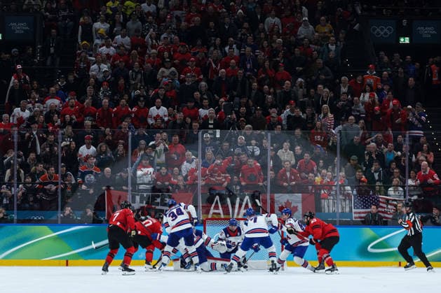 Game actions in front of the Canada supporters grandstand during the Olympic Winter games, Winterspiele,Spiele, Summer games Milano-Cortina 2026, Men s Ice hockey, Eishockey Final - Canada vs USA on February 22, 2026 at Milano Santagiulia Ice Hockey Arena in Milan, Italy  Copyright: xFabrizioxCarabelli IPAxSportx xipa-agency.netx xx IPA_71875832 IPA_Agency_IPA71875832