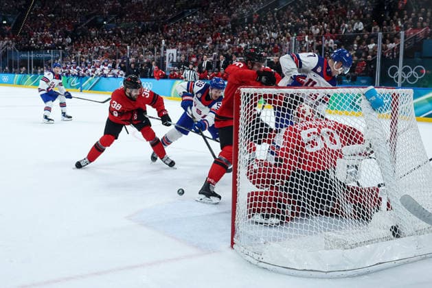 USA s Jake Guentzel in action against Canada s Brandon Hagel during the Olympic Winter games, Winterspiele,Spiele, Summer games Milano-Cortina 2026, Men s Ice hockey, Eishockey Final - Canada vs USA on February 22, 2026 at Milano Santagiulia Ice Hockey Arena in Milan, Italy  Copyright: xFabrizioxCarabelli IPAxSportx xipa-agency.netx xx IPA_71875838 IPA_Agency_IPA71875838