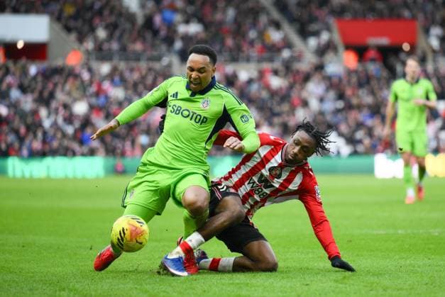 Romaine Mundle of Sunderland challenges Kenny Tete of Fulham Sunderland v Fulham, Premier League, Football, Stadium of Light, Sunderland, UK - 22 Feb 2026Sunderland Stadium of Light United Kingdom EDITORIAL USE ONLY No use with unauthorised audio, video, data, fixture lists, club league logos or live services. Online in-match use limited to 120 images, no video emulation. No use in betting, games or single club league player publications. Copyright: xRichardxLee Shutterstockx 16681560cd