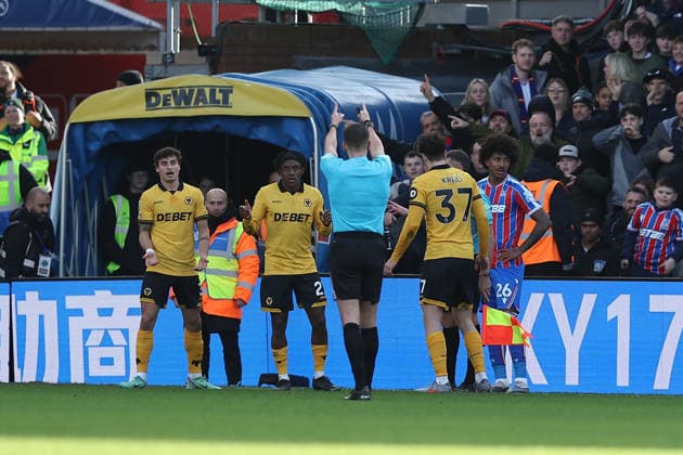 22nd February 2026; Selhurst Park, Selhurst, London, England; Premier League Football, Crystal Palace versus Wolverhampton Wanderers; referee Thomas Kirk is unhappy with the speed of Ladislav Krejci of Wolverhampton Wanderers leaving the pitch following his a red card from a second yellow card  KatiexChan Content restricted for UK based newspaper