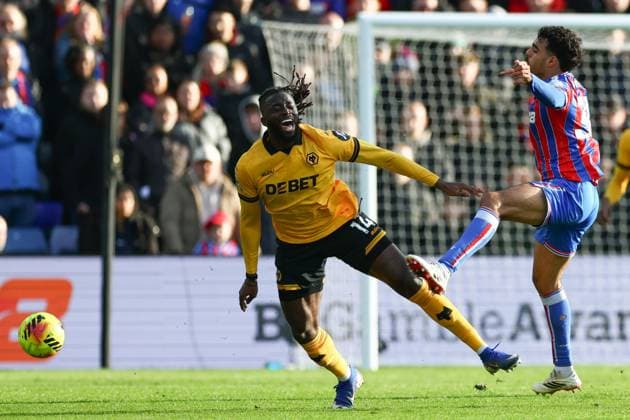 Tolu Arokodare of Wolverhampton Wanderers fouled by Chadi Riad of Crystal Palace Crystal Palace v Wolverhampton Wanderers, Premier League, Football, Selhurst Park, London, UK - 22 Feb 2026London Selhurst Park United Kingdom EDITORIAL USE ONLY No use with unauthorised audio, video, data, fixture lists, club league logos or live services. Online in-match use limited to 120 images, no video emulation. No use in betting, games or single club league player publications. Copyright: xSimonxDael Shutterstockx 16681548az