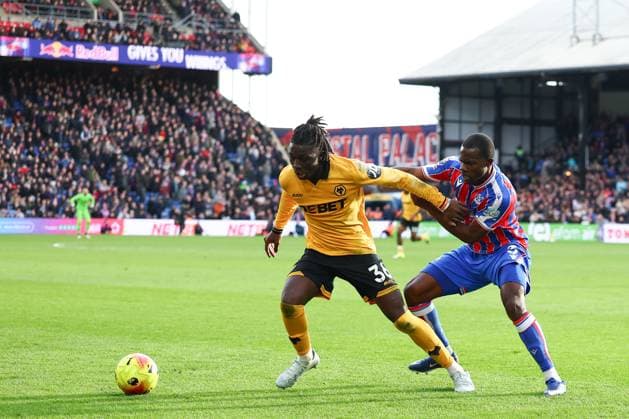 Mateus Mane of Wolverhampton Wanderers under pressure from Tyrick Mitchell of Crystal Palace Crystal Palace v Wolverhampton Wanderers, Premier League, Football, Selhurst Park, London, UK - 22 Feb 2026London Selhurst Park United Kingdom EDITORIAL USE ONLY No use with unauthorised audio, video, data, fixture lists, club league logos or live services. Online in-match use limited to 120 images, no video emulation. No use in betting, games or single club league player publications. Copyright: xSimonxDael Shutterstockx 16681548bc