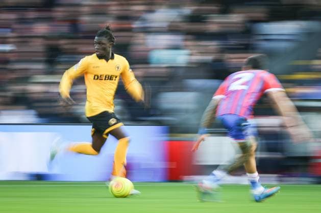 Mateus Mane of Wolverhampton Wanderers takes on Daniel Munoz of Crystal Palace Crystal Palace v Wolverhampton Wanderers, Premier League, Football, Selhurst Park, London, UK - 22 Feb 2026London Selhurst Park United Kingdom EDITORIAL USE ONLY No use with unauthorised audio, video, data, fixture lists, club league logos or live services. Online in-match use limited to 120 images, no video emulation. No use in betting, games or single club league player publications. Copyright: xSimonxDael Shutterstockx 16681548be