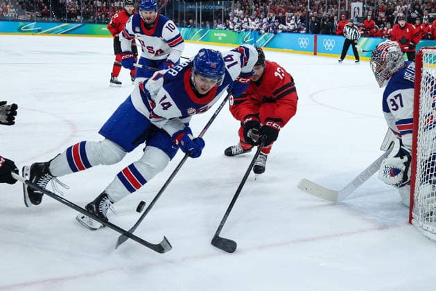 GIOCHI OLIMPICI - Olimpiadi Invernali Milano-Cortina 2026 - Men s Ice hockey, Eishockey - Canada vs USA USA s Brock Faber in action against Canada s Sam Reinhart during the Olympic Winter games, Winterspiele,Spiele, Summer games Milano-Cortina 2026, Men s Ice Hockey Final - Canada vs USA on February 22, 2026 at Milano Santagiulia Ice Hockey Arena in Milan, Italy Cortina D Ampezzo Italy  Copyright: xIPAxSport ABACAx