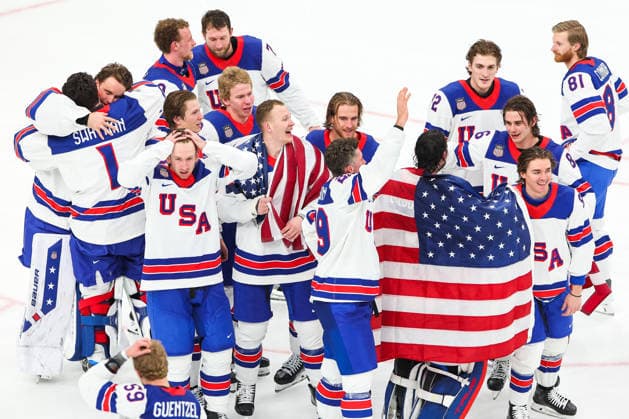 ITALY, MILAN - FEBRUARY 22, 2026: The USA s players celebrate victory in the men s Ice hockey, Eishockey gold medal match against Canada during the 2026 Winter Olympic Games, Olympische Spiele, Olympia, OS at Milano Santagiulia Ice Hockey Arena. Peter Kovalev TASS  89107591