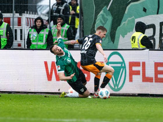 Paul Joly (1. FC Kaiserslautern, 26) im Zweikampf gegen Torge Paetow (SC Preussen Muenster, 16) Preussen Muenster vs. 1. FC Kaiserslautern, Fussball, 2. Bundesliga, 23. Spieltag, Saison 2025 2026, 22.02.2026 DFL REGULATIONS PROHIBIT ANY USE OF PHOTOGRAPHS AS IMAGE SEQUENCES AND OR QUASI-VIDEO, Preussen Muenster vs. 1. FC Kaiserslautern, Fussball, 2. Bundesliga, 23. Spieltag, Saison 2025 2026, 22.02.2026 Muenster