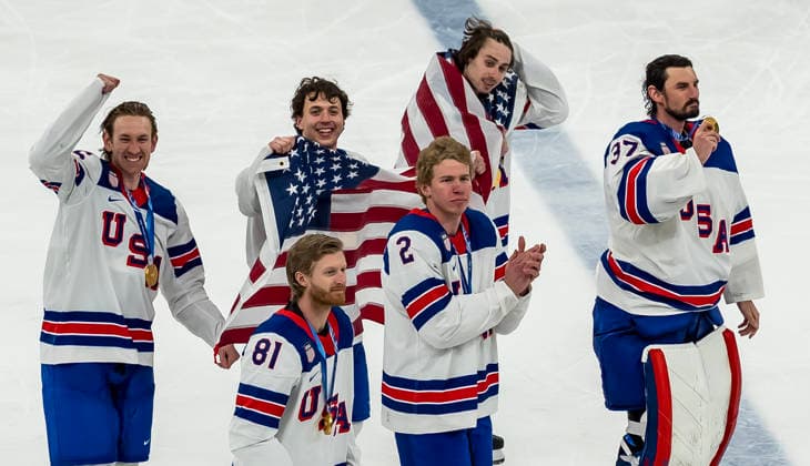 February 22, 2026, Milan, Lombardy, Italy: Team USA celebrates after defeating Team Canada 2:1 in overtime for the Mens Gold Medal Game at the Milano Santagiulia Ice hockey, Eishockey Arena in MILAN, Italy during the 2026 Milano Cortina Winter Olympics. Olympics 2026: Milano Cortina: Ice Hockey Mens: Gold Medal Game: USA 2:1 CAN  - ZUMAa161 20260222_oly_a161_029 Copyright: xWalterxG.xArcex