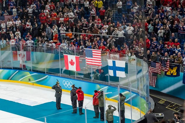 February 22, 2026, Milan, Lombardy, Italy: Team USA stands for the national anthem after defeating Team Canada 2:1 in overtime for the Mens Gold Medal Game at the Milano Santagiulia Ice hockey, Eishockey Arena in MILAN, Italy during the 2026 Milano Cortina Winter Olympics. Milan Italy - ZUMAa161 20260222_oly_a161_072 Copyright: xWalterxG.xArcex