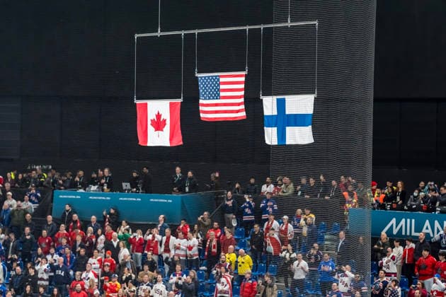 February 22, 2026, Milan, Lombardy, Italy: Team USA stands for the national anthem after defeating Team Canada 2:1 in overtime for the Mens Gold Medal Game at the Milano Santagiulia Ice hockey, Eishockey Arena in MILAN, Italy during the 2026 Milano Cortina Winter Olympics. Milan Italy - ZUMAa161 20260222_oly_a161_076 Copyright: xWalterxG.xArcex