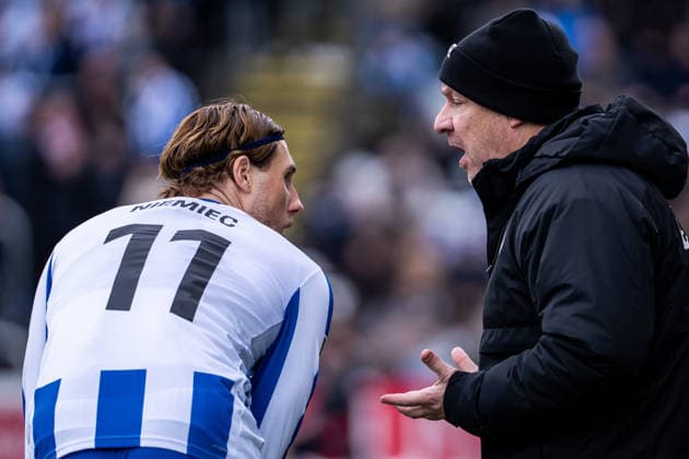 Odense BK v FC Copenhagen, 3F Superliga football, Odense, Denmark Odense, Denmark. 21st, February 2026. Head coach Alexander Zorniger of Odense BK seen with Jona Niemiec (11) during the 3F Superliga match between Odense BK and FC Copenhagen at Nature Energy Park in Odense. Denmark, Odense  Copyright: xGonzalesxPhoto KentxRasmussenx