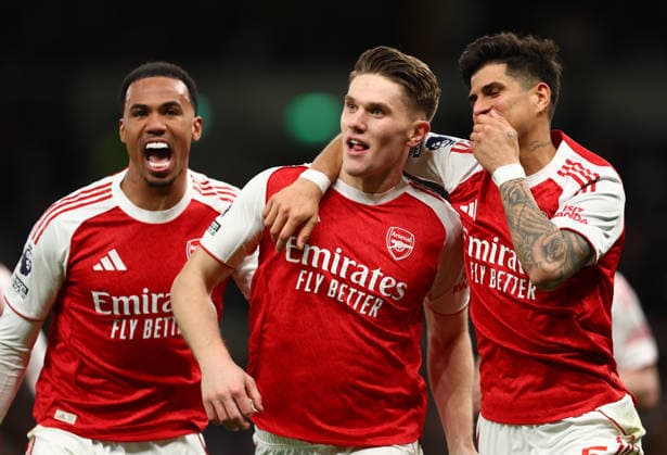 London, England, 22nd February 2026. Viktor Gyokeres (C) of Arsenal celebrates with Gabriel (L) and Piero Hincapie of Arsenal after scoring to make it 2-1 during the Tottenham Hotspur vs Arsenal Premier League match at the Tottenham Hotspur Stadium, London. Picture credit should read: Paul Terry Sportimage EDITORIAL USE ONLY. No use with unauthorised audio, video, data, fixture lists, club league logos or live services. Online in-match use limited to 120 images, no video emulation. No use in betting, games or single club league player publications. SPI_047_PT_Tottenham_Arsenal SPI-4545-0047
