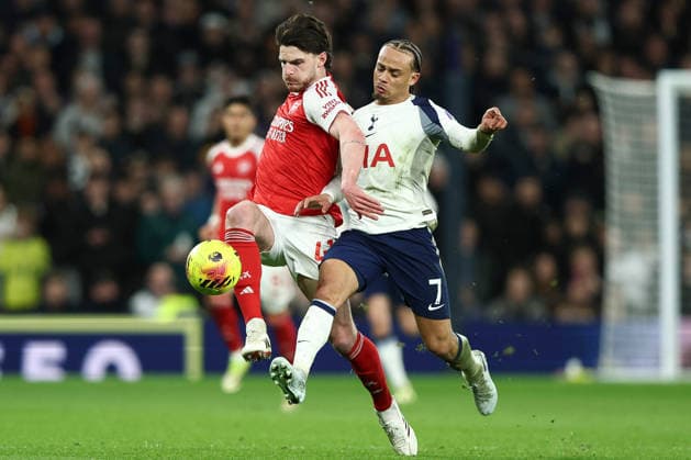 Tottenham Hotspur v Arsenal, Premier League Declan Rice of Arsenal tackles Xavi Simons of Tottenham Hotspur during the Tottenham Hotspur v Arsenal Premier League match at the Tottenham Hotspur Stadium, London, England on 22 February 2026 Credit: Ian Stephen Every Second Media Editorial use only. All images are copyright Every Second Media Limited. No images may be reproduced without prior permission. All rights reserved. Premier League and Football League images are subject to licensing agreements with Football DataCo Limited. see https: www.football-dataco.com Copyright: xIMAGO EveryxSecondxMediax ESM-1815-0033 IanxStephenx xEveryxSecondxMediax
