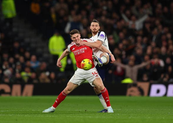 22nd February 2026; Tottenham Hotspur Stadium, London, England; Premier League Football, Tottenham Hotspur versus Arsenal; Radu Dragusin of Tottenham Hotspur challenges Viktor Gyokeres of Arsenal  JPxFletcher Content restricted for UK based newspaper