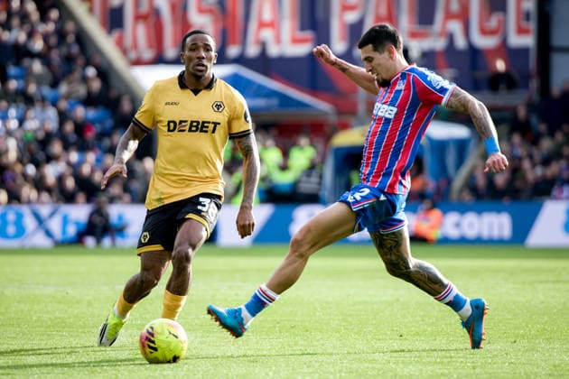 LONDON, ENGLAND - FEBRUARY 22: Jackson Tchatchoua of Wolverhampton Wanderers and Daniel Munoz of Crystal Palace in action during the Premier League match between Crystal Palace and Wolverhampton Wanderers at Selhurst Park on February 22, 2026 in London, England. (Photo by Pedro Porru) SPO  Copyright: xPedroxPorru