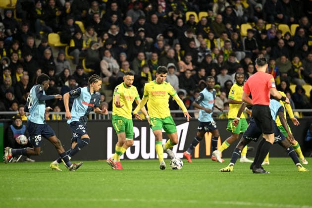 FC Nantes v Le Havre Atheltic Club - Ligue 1 McDonald s 2025 2026 33 Kenny QUETANT (hac) - 13 Francis COQUELIN (fcn) - 02 Ali YOUSSIF YOUSSEF Ibrahim Almusrati (fcn) during the Ligue 1 McDonald s match between Nantes and Le Havre at Stade de la Beaujoire on February 22, 2026 in Nantes, France. Nantes France  Copyright: xFEPx 776348293