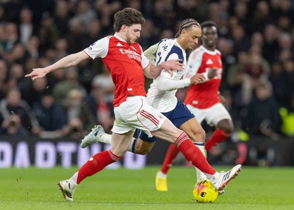 Tottenham Hotspur v Arsenal, Premier League, Football, Tottenham Hotspur Stadium, London, UK - 22 Feb 2026 Declan Rice of Arsenal FC (41) wins possession from Xavi Simons of Tottenham Hotspur (7) London Tottenham Hotspur Stadium Tottenham GBR, UK NEWSPAPERS OUT Copyright: xEllixBirchx