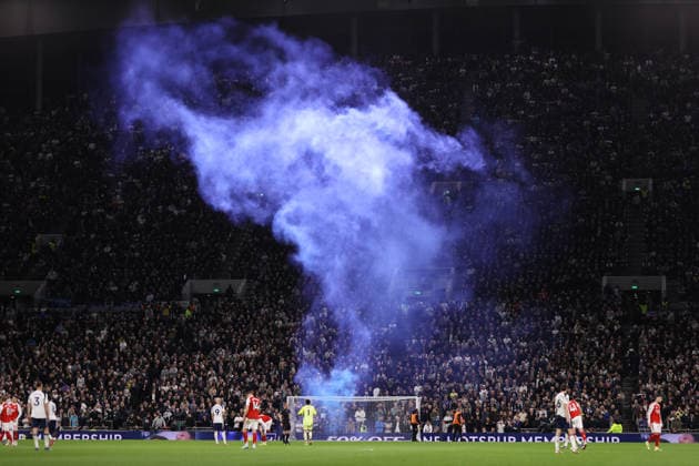 Tottenham Hotspur v Arsenal 22 February 2026, London - Premier League Football - Tottenham Hotspur v Arsenal - A blue flare is thrown onto the pitch at The Tottenham Hotspur Stadium - Photo: Jacques Feeney Offside. London UK Copyright: xJacquesxFeeneyx xOffsidexOffside