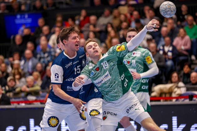 22.02.2026, Handball, HBL, Bergischer HC - Füchse Berlin, Mitsubishi Electric HALLE Düsseldorf: Mathias Gidsel (Füchse Berlin 19) im Zweikampf gegen Lars Kooij (BHC 15) Nordrhein-Westfalen Deutschland