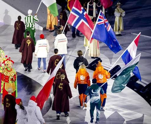 VERONA - Flag bearers Jorrit Bergsma and Xandra Velzeboer during the closing ceremony of the 2026 Winter Olympics in the historic Arena di Verona. ROBIN VAN LONKHUIJSEN ANP xVIxANPxSportx xxANPxIVx 551492508 originalFilename: 551492508.jpg