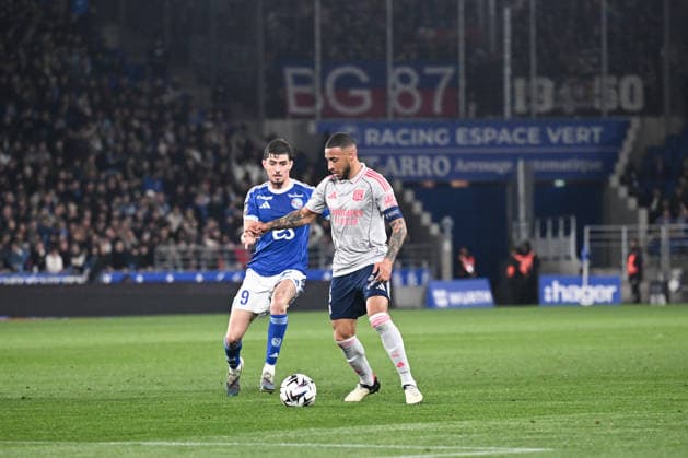 RC Strasbourg Alsace v Olympique Lyonnais - Ligue 1 McDonald s 09 Joaquin PANICHELLI (rcsa) - 08 Corentin TOLISSO (ol) during the Ligue 1 McDonald s match between Strasbourg and Lyon at Stade de la Meinau on February 22, 2026 in Strasbourg, France. Strasbourg France  Copyright: xFEPx 776348297