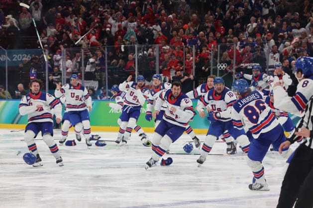 February 22, 2026, Milan, Lombardy, Italy: Team United States celebrates winning against Team Canada after JACK HUGHES ( 86, right) of Team United States scored a winning goal in overtime in the men s Ice hockey, Eishockey gold medal game during the Milano Cortina 2026 Olympic Winter games, Winterspiele,Spiele, Summer games at Milano Santagiulia Ice Hockey Arena. Olympics 2026: Milano Cortina: Ice Hockey-Men Finals - Gold Medal Game-CAN V USA  - ZUMAm117 20260222_oly_m117_040 Copyright: xDavidxMcIntyrex