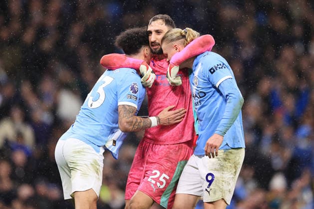 Football - Premier League - Manchester City v Newcastle United 21st February 2026 - Premier League - Manchester City v Newcastle United - Manchester City goalkeeper Gianluigi Donnarumma (C) celebrates victory with Nico O Reilly of Manchester City (L) and Erling Haaland of Manchester City - Photo: Simon Stacpoole Offside. Manchester UK Copyright: xSimonxStacpoolexOffside