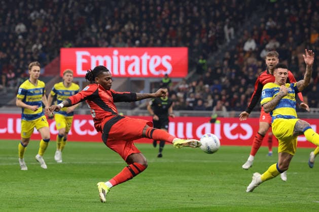 Milan, Italy, 22nd February 2026. Rafael Leao of AC Milan fires a shot goalwards during the AC Milan vs Parma Serie A match at Giuseppe Meazza, Milan. Picture credit should read: Jonathan Moscrop Sportimage EDITORIAL USE ONLY. No use with unauthorised audio, video, data, fixture lists, club league logos or live services. Online in-match use limited to 120 images, no video emulation. No use in betting, games or single club league player publications. SPI_084_MILAN_PARMA SPI-4549-0084