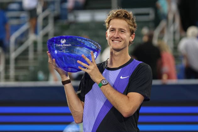February 22, 2026, Delray Beach, Florida, USA: SEBASTIAN KORDA (USA) poses with the championship trophy after the Men™s Singles Finals match at Delray Beach Tennis Center. Tennis 2026: Delray Beach Open: Singles Final  - ZUMA 20260222_mda_v151_218 Copyright: xLorenzoxVasquezx