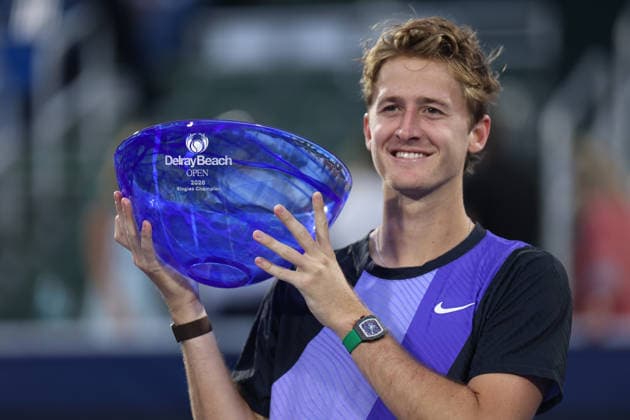 February 22, 2026, Delray Beach, Florida, USA: SEBASTIAN KORDA (USA) poses with the championship trophy after the Men™s Singles Finals match at Delray Beach Tennis Center. Korda defeated Tommy Paul 6-4, 6-3. Delray Beach USA - ZUMA 20260222_mda_v151_216 Copyright: xLorenzoxVasquezx