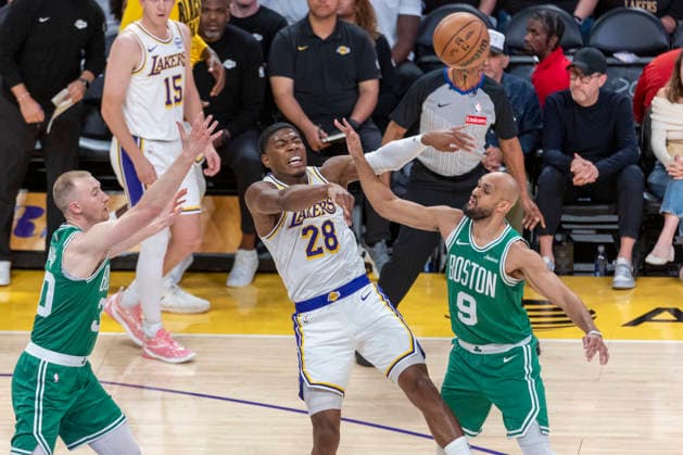 February 22, 2026, Los Angeles, California, USA: Los Angeles LakersÃ¢â‚¬â ¢ Rui Hachimura (28) passes the ball against Boston CelticsÃ¢â‚¬â ¢ Derrick White (9) during an NBA, Basketball Herren, USA basketball game at Crypto.com Arena on Sunday, Feb. 22, 2026 in Los Angeles. NBA 2026: Celtics 111: 89 Lakers  - ZUMAc68_ 20260222_zaf_c68_032 Copyright: xRingoxChiux