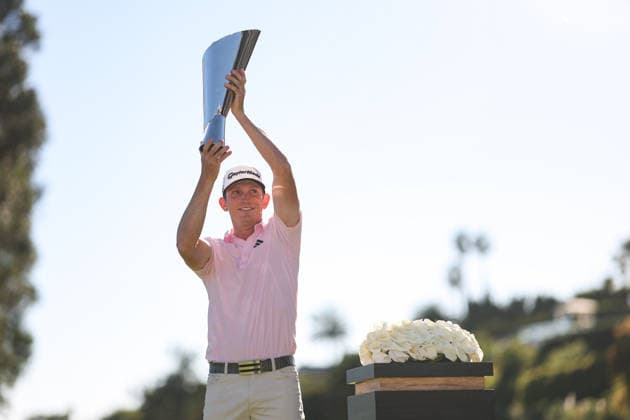 February 22, 2026, Pacific Palisades, California, USA: JACOB BRIDGEMAN poses with the winnerÃ¢â‚¬â ¢s trophy during the trophy ceremonies after the Genesis Invitational at the Riviera Country club in Pacific Palisades, California. Pacific Palisades USA - ZUMAt158 20260222_zsp_t158_154 Copyright: xBrentonxTsex