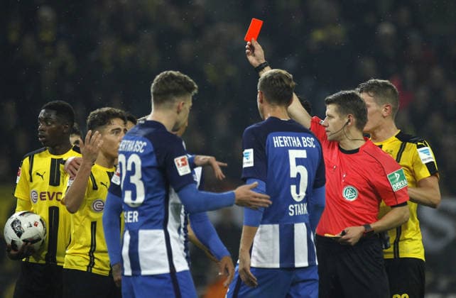 Borussia Dortmund and Hertha BSC Berlin : Bundesliga DORTMUND, GERMANY - OCTOBER 14: Referee Patrick Ittrich (R) shows red card to Emre Mor (L) of Borussia Dortmund during the Bundesliga soccer match between Borussia Dortmund and Hertha BSC Berlin at the Signal Iduna Park in Dortmund, Germany on October 14, 2016. Germany World. Editorial use only. Please get in touch for any other usage.  Copyright: x2025xAnadoluxLeonxKuegelerx