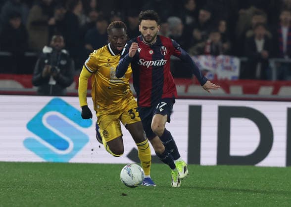 Bologna™s Joao Mario fight for the ball with Udinese™s Jordan Zemura during the Serie A soccer match between Bologna and Udinese at the Renato Dall™Ara Stadium in Bologna -Monday, February 23, 2026. - Soccer .  Copyright: xGiannixSantandrea LaPressex